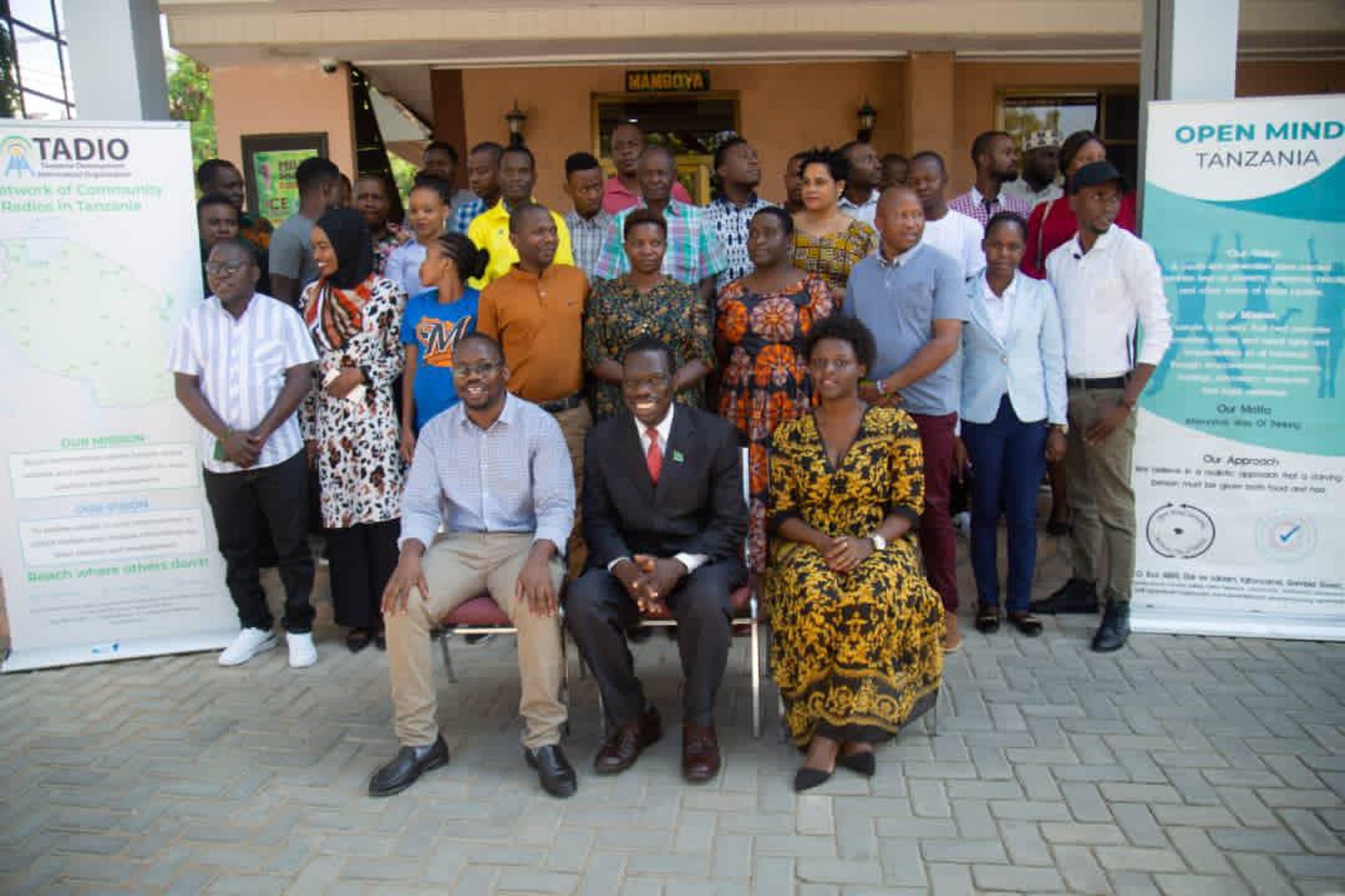 black and brown leather padded tub sofa